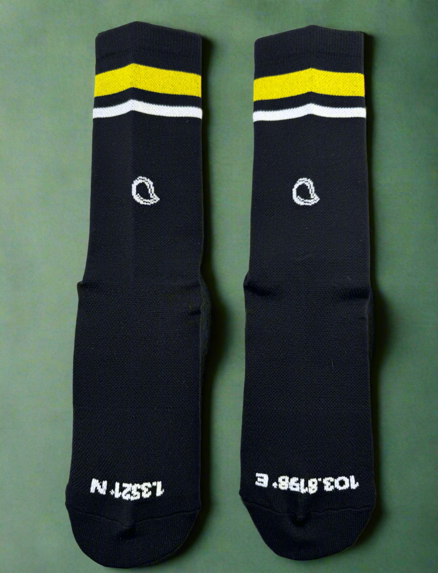front view of a pair of black sports crew socks 